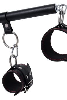 Черная распорка с 4 манжетами для рук и ног