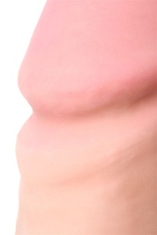 Фаллоимитатор с мошонкой на присоске RealStick Elite Dildo телесный - 24 см