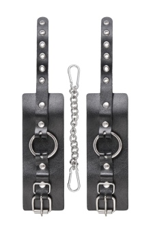 Черные наручники из толстой натуральной кожи с люверсами